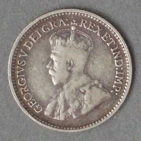 Color photo: Obverse view of 5 cent coin - Newfoundland 1929