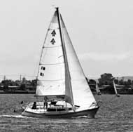 B/W photo:  Sailboat underway on San Diego Bay