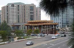 Color photo: Elevated view of La Jolla Village Dr. and trolley construction on Genesee Ave.