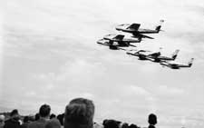 grayscale photograph: 5 jets in formation