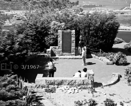 B/W photo: View of tourists and historical plaque; taken from atop lighthouse - Embedded text: 3/1967