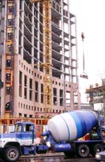 Color photo: View of a new high-rise building under construction