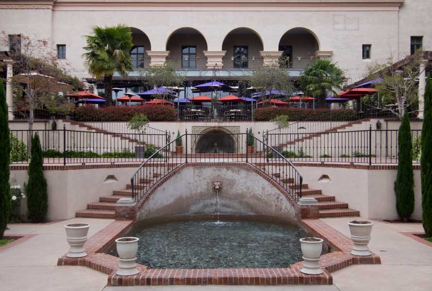 Spanish architecture, 3 levels, 2 fountains, 4 staircases with restaurant on top level