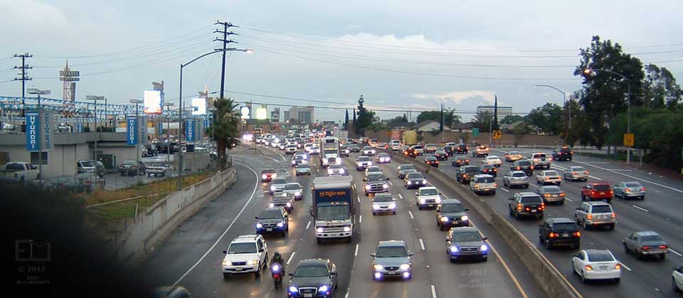 Twilight view of freeway traffic from an overpass