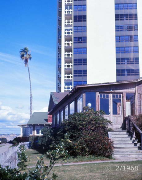 E6 color photo - Portrait view of multi-picture windowed residence with 939 high-rise in background - Embedded text: 2/1968