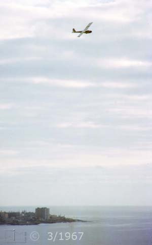 K14 color photo - Portrait view of glider over La Jolla - Embedded text: 3/1967