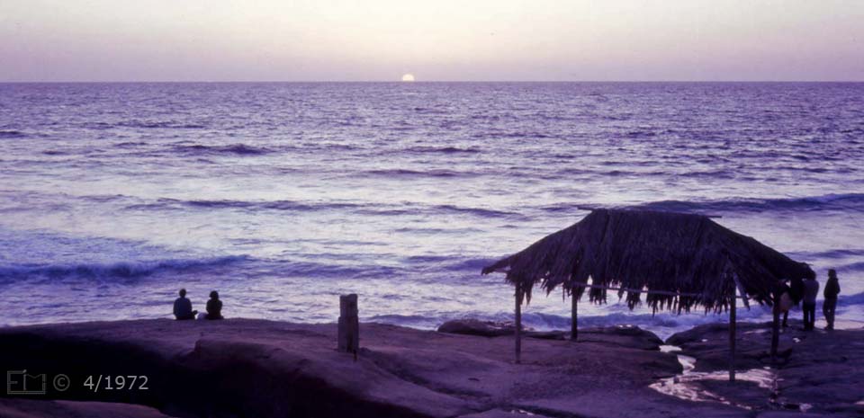 E6 color photo - Landscape view of Windandsea Beach with bisected sun on horizon - Embedded text: 4/1972