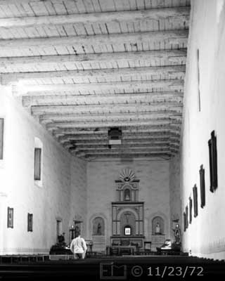 B/W photo: View of church interior looking towards alter - Embedded text: 11/23/72