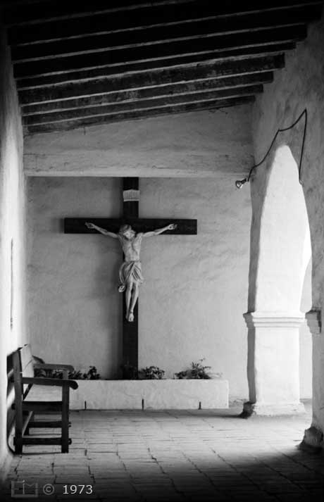 B/W photo: Large wall mounted crucifix - Embedded text: 1972