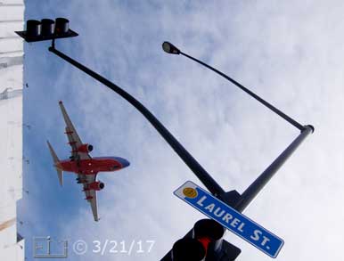 Color photo: Airliner stoped maiair on approach to landing - Embedded text: 3/2i/17