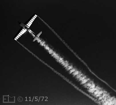 B/W photo: Stunt airplane trailing smoke - Embedded text: 11/5/72