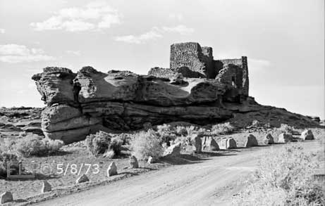B/W photo of adjacent roadway and ruin - Embedded text: 5/8/73