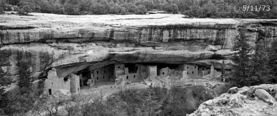 B/W photo: Cliff dwelling ruins viewed from across canyon - Embedded text: 5/11/73