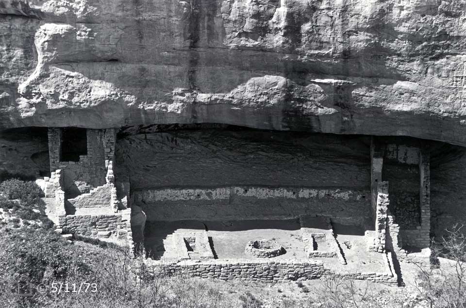 B/W photo: Close view of Fire Temple ruins at base of cliff - Embedded text: 5/11/73