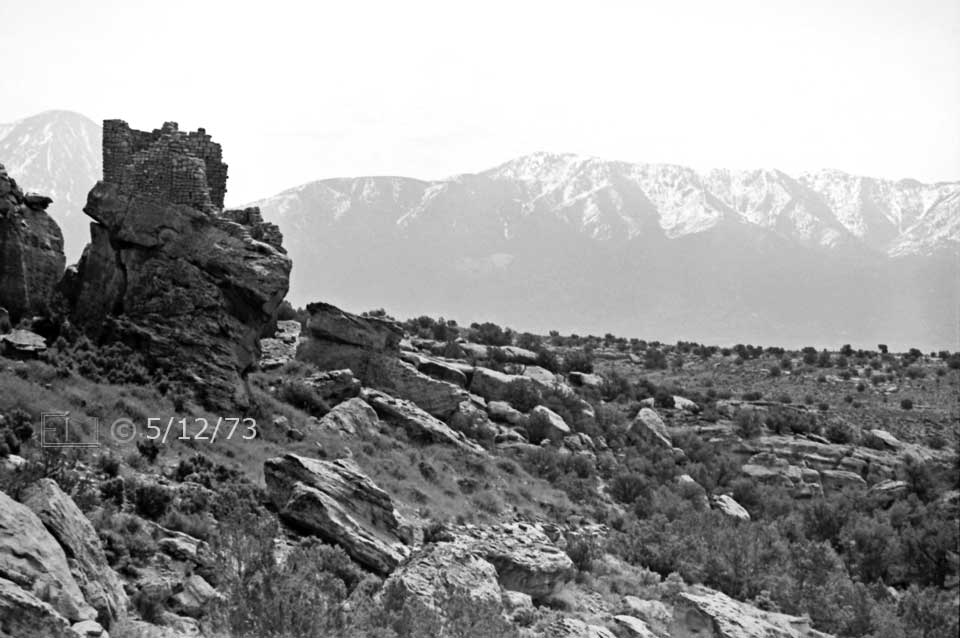 B/W photo: View of canyon hillside and distant mountains - Embedded text: 5/12/73