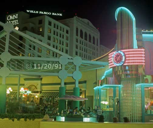 Color photo: Outdoor diners and restaurant atop Horton Plaza with nearby buildings in background - Embedded text: 11/20/91