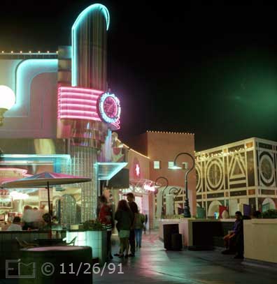 Color photo: Customers await entrance to restaurant atop Horton Plaza - Embedded text: 11/25/91