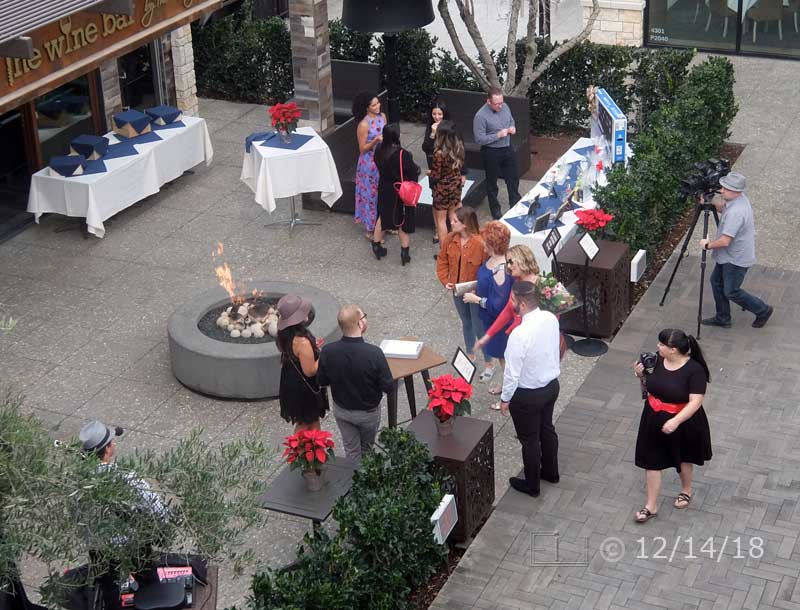 Color photo: Elevated view of UTC business opening - Embedded text: 12/14/18