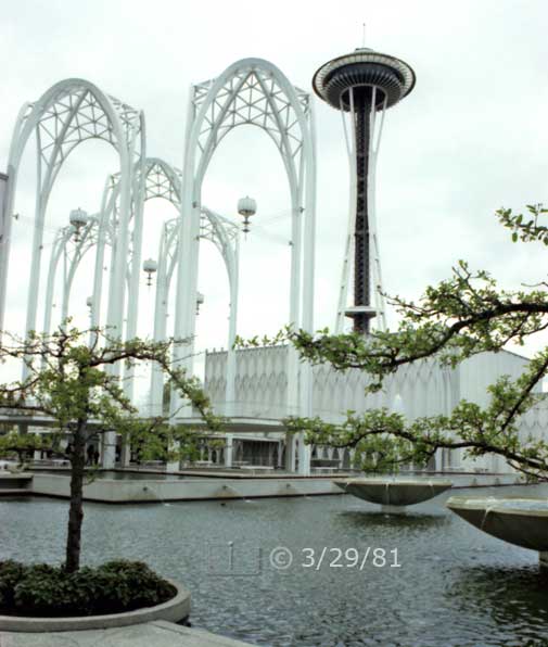 Color photo: The Space Needle and its Seattle Center Park environment - Embedded text: 3/29/81