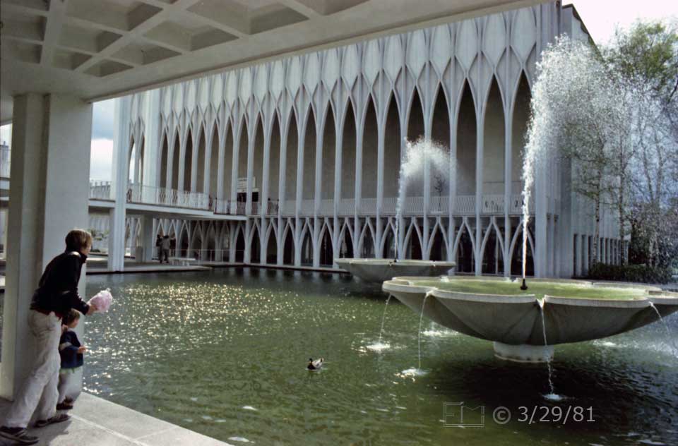 Color photo: Tourists view architecture and water fountains of Seattle Center Park - Embedded text: 3/29/81