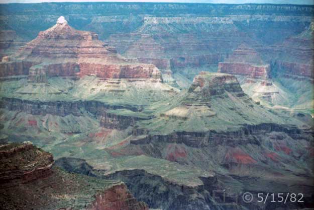 Color photo: Landscape view of Grand Canyon rock formations including Temple of Isis and Cheops Pyramid - Embedded text: 5/15/82