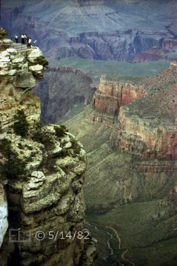 Color photo: Portrait view displaying height above canyon floor of spectator overlook - Embedded text: 5/14/82