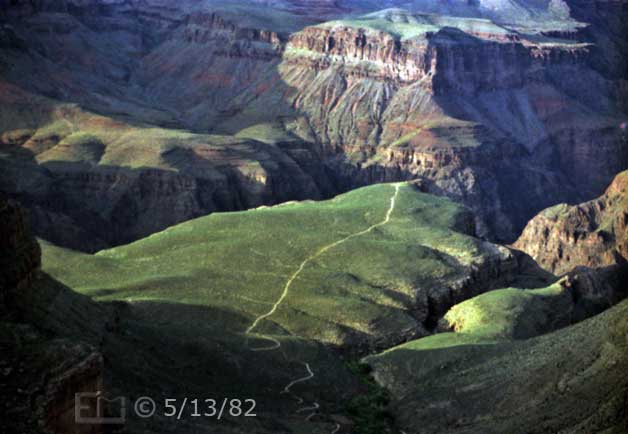 Color photo: Evening view of hiking trail out to Plateau Point - Embedded text: 5/13/82