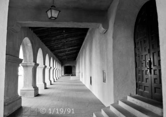 B/W photo: Arcaded walkway on south of side of Plaza de California; looking east - Embedded text: 1/19/91