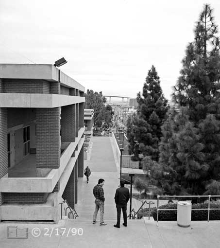 B/W photo: Elevated view of stair-way on the West side of 'L' building - Embedded text: 2/17/90