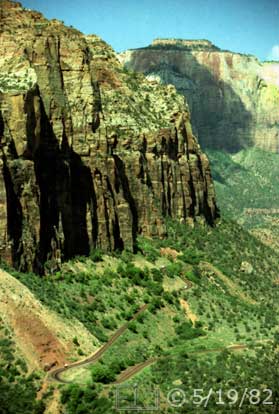 Color photo: Medium view from Canyon Overlook of highway switchbacks and West Temple - Embedded text: 5/19/82