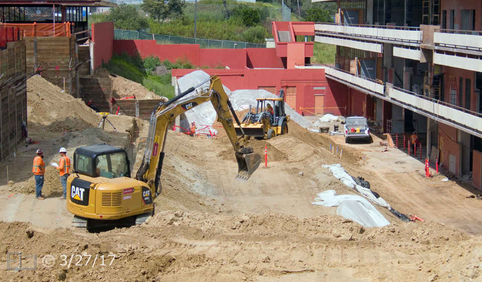 Color photo: View from South (L building) of major landscaping underway between 'A' and 'T' buildings - Embedded text: 3/27/17