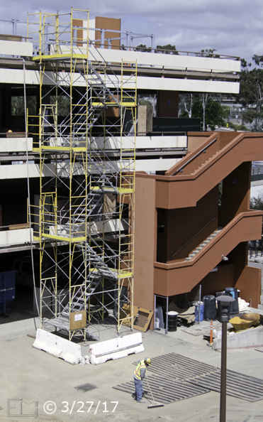 Color photo: View from South (L building) of East side of 'T' building being renovated - Embedded text: 3/27/17