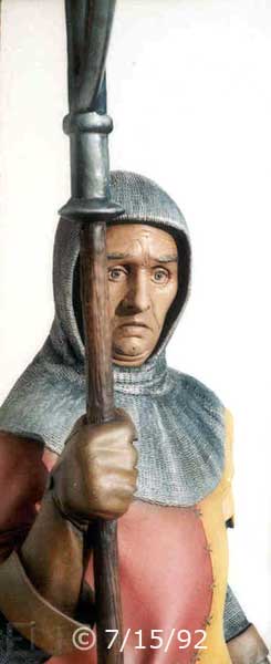 Color photo: Statue guardian to right of entrance of EXcalibur Casino; with an ominous stare - Embedded text: 7/15/92