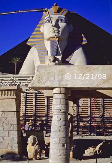 Color photo: Demolition and construction in front of 'Luxor' pyramid  - Embedded text: 12/21/98