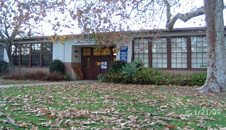 Color photo: Fordham St. entrance to old, main West City Center building - Embedded text: 1/21/09