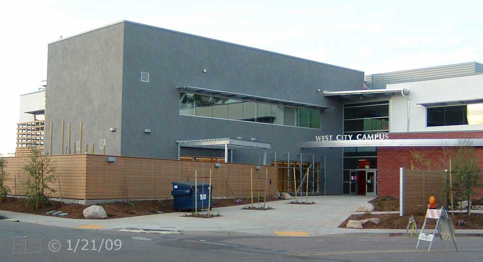 Color photo: West entrance of new West City Campus building  - Embedded text: 1/21/09