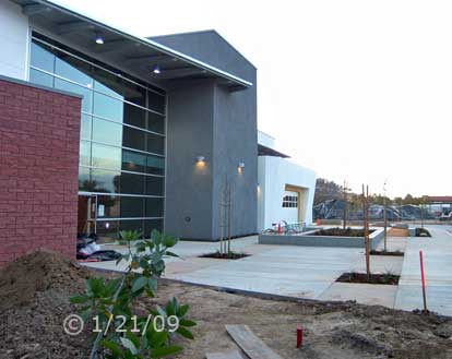 Color photo: East entrance of new West City Campus building - Embedded text: 1/21/09