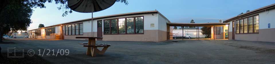 Color photo: Wide view, looking west, of old West City Center buildings - Embedded text: 1/21/09