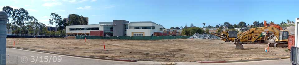Color photo: View of cleared land and new West City Campus building from across alley; looking west - Embedded text: 3/15/09