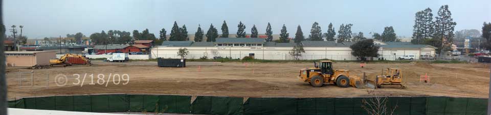 Color photo: View of cleared land from 2nd floor window of new West City Campus building; looking east - Embedded text: 3/18/09