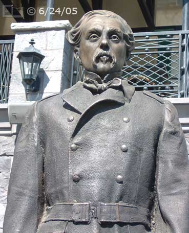 DSC color photo: Statue at Irish Pub; NYNY - Embedded text: 6/24/05