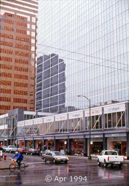 Color photo: Street traffic and buildings of downtown Vancouver - Image taken: 4/7~12/1994