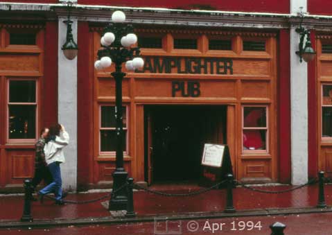 Color photo: Pedestrians aproaching entrance to 'Lamplighter Pub' - Image taken: 4/7~12/1994