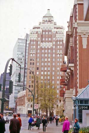 Color photo: Street traffic and buildings of downtown Vancouver - Image taken: 4/7~12/1994