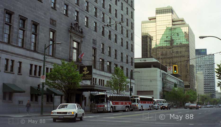 Color photo: Hotel Vancouver and its reflection on the glass wall of an adjacent building  - Embedded text: May 1988