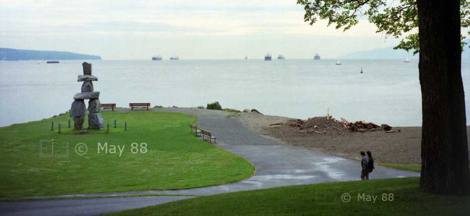 Color photo: Inukshuk Stone Sculpture and English Bay viewed from English Bay Beach Park - Embedded text: May 1988