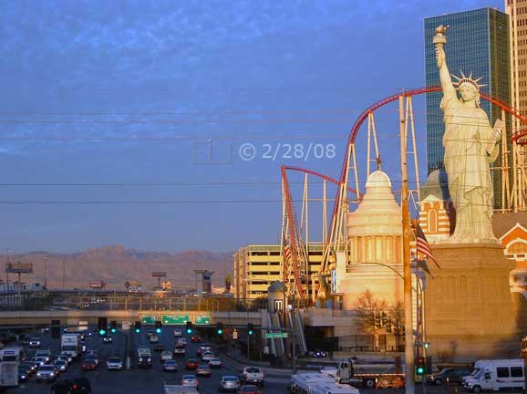 Dsc color photo: Tropicana Ave (west) and NYNY during sunrise- Embedded text: 2/28/08