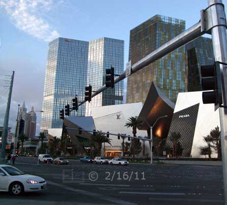 DSC color photo: Street level view, looking south, of Las Vegas Blvd, from Harmon Ave - Embedded text: 2/16/11