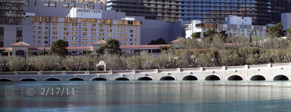 DSC color photo: Walkway to Bellagio entrance with Jockey Club in background  - Embedded text: 2/17/11