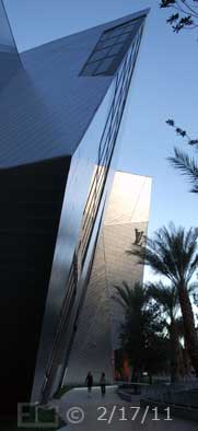 DSC color photo: Walking north on Las Vegas Blvd approaching Louis Vuitton building - Embedded text: 2/17/11